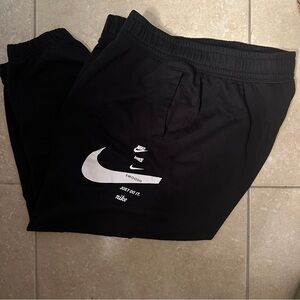 LADIES NIKE SWOOSH 1XL JOGGERS W/ SIDE POCKETS (GOOD SHAPE) NO HOLES/RIPS)
